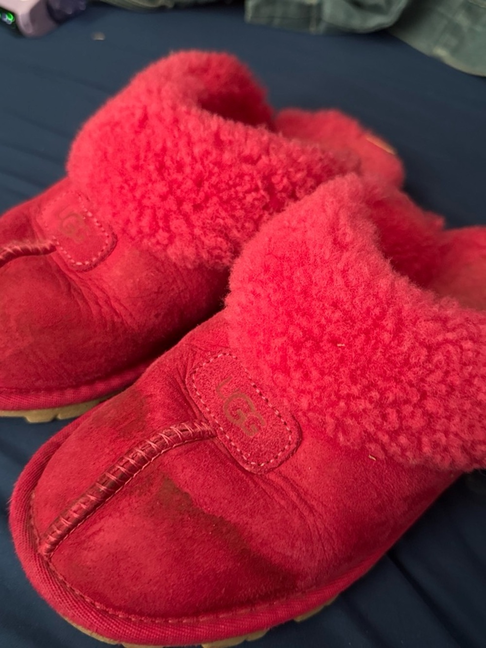 UGG women’s Plush Shearling Slip-On Slippers in pink